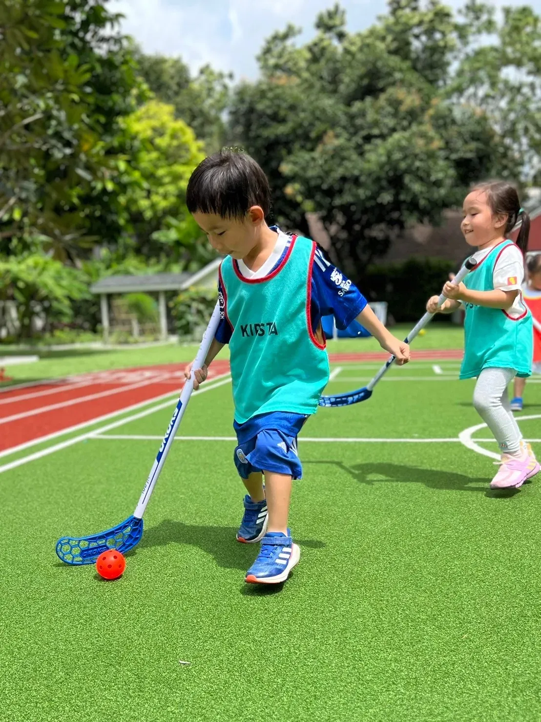 Children running together outdoors